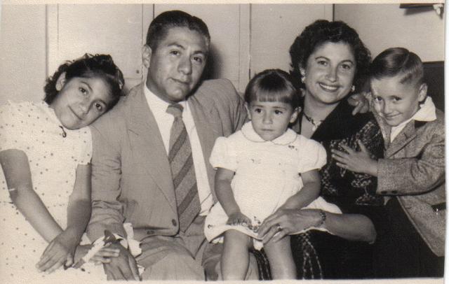 My Mom, Dad, Mario, Laura - that's me, leaning on my Dad's shoulder!